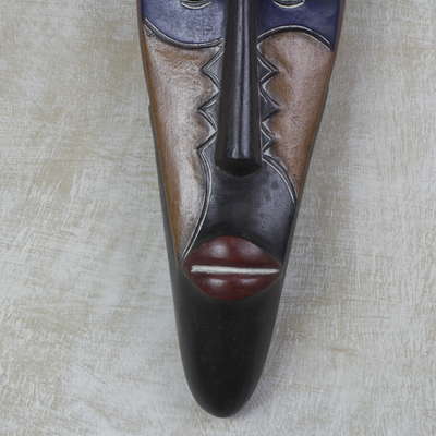 Afrikanische Holzmaske - Handgeschnitzte afrikanische Maske aus Sese-Holz in Dunkelbraun und Marineblau