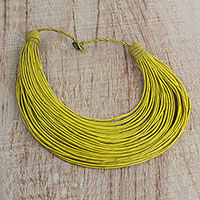 Leather statement necklace, 'Nooma' - Handmade Yellow Leather Strand Statement Necklace from Ghana