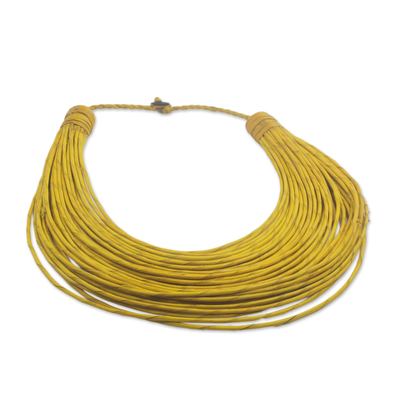 Leather statement necklace, 'Nooma' - Handmade Yellow Leather Strand Statement Necklace from Ghana