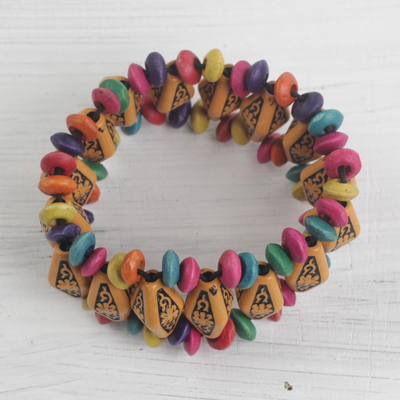 Wood and recycled plastic beaded stretch bracelet, 'Delightful Day' - Wood and Recycled Plastic Beaded Stretch Bracelet from Ghana