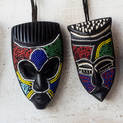 Afrikanische Perlenholzmasken, „Melowo“ (3er-Set) - Handgefertigte kleine afrikanische Perlenholzmasken (3er-Set)