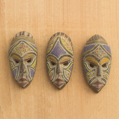 African beaded wood masks, 'Wise Counsel' (set of 3) - Artisan Crafted Small Wood Masks with Glass Beads (Set of 3)
