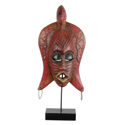 Maske aus afrikanischem Holz, „Fameye“ – tiefrosafarbene afrikanische Holzmaske auf Ständer