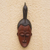 Afrikanische Holzmaske - Traditionelle afrikanische Vogel-Holzmaske in Braun- und Schwarztönen