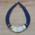 Horn pendant necklace, 'Sida' - Crescent-Shaped Horn Pendant Necklace with Blue Leather Cord (image 2) thumbail