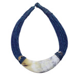 Horn pendant necklace, 'Sida' - Crescent-Shaped Horn Pendant Necklace with Blue Leather Cord
