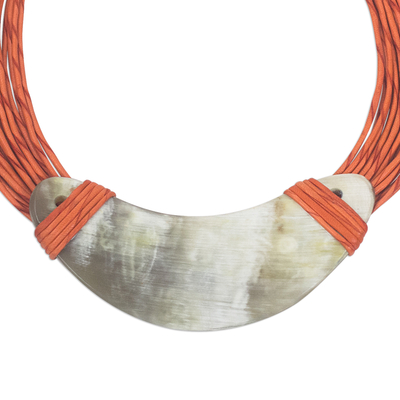 Horn pendant necklace, 'Somo' - Crescent-Shaped Horn Pendant Orange Leather Cord Necklace