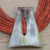 Statement-Halskette aus Leder und Knochen, „Laami“ – ghanaische Statement-Kordelkette aus orangefarbenem Leder und Knochen