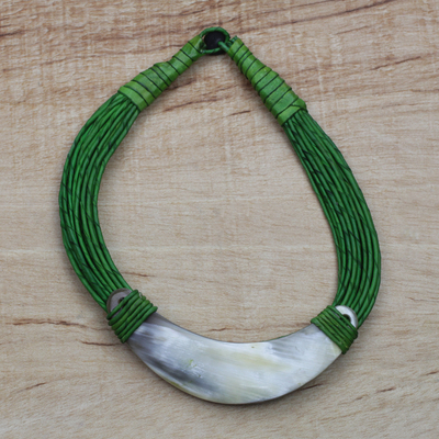 Horn pendant necklace, 'Buudu Honored' - Crescent-Shaped Horn Pendant Green Leather Cord Necklace