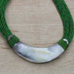 Horn pendant necklace, 'Buudu Honored' - Crescent-Shaped Horn Pendant Green Leather Cord Necklace