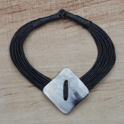 Horn pendant necklace, 'Pamga' - Diamond-Shaped Horn Pendant Black Leather Cord Necklace