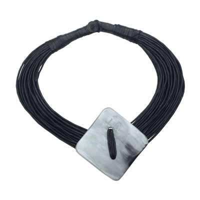 Horn pendant necklace, 'Pamga' - Diamond-Shaped Horn Pendant Black Leather Cord Necklace