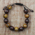 Wood beaded bracelet, 'Lively Shades' - Adjustable Sese Wood Beaded Bracelet from Ghana thumbail
