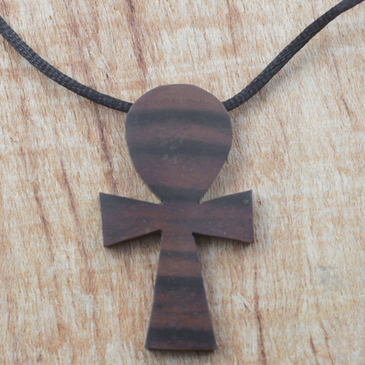 Ebony wood pendant necklace, 'Akuaba Pride' - Ebony Wood Cultural Pendant Necklace from Ghana