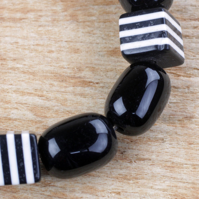 Recycled glass beaded stretch bracelet, 'Maame' - Black and White Recycled Beaded Glass Stretch Bracelet