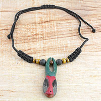 Wood pendant necklace, 'Onua Do Horn' - African Mask Hand Carved Sese Wood Necklace