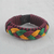 Men's wristband bracelet, 'Bravado' - Men's Multi-Color Braided Cord Wristband Bracelet