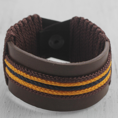 Men's leather wristband bracelet, 'Okukudurufuo' - Men's Brown Leather with Yellow Cord Wristband Bracelet