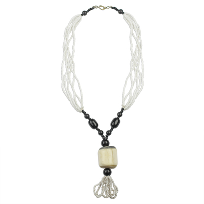 Horn and recycled glass beaded pendant necklace, 'Mother's Warmth' - White and Black Beaded Glass Horn Pendant Necklace