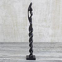 Ebony statuette, 'Coiled Charm' - Hand Carved Ebony Wood Abstract Woman Statuette from Ghana