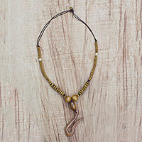 Wood beaded pendant necklace, 'Odo Ye De' - Sese Wood Beaded Pendant Necklace Handcrafted in Ghana