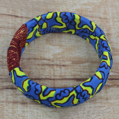 Wood and cotton bangle bracelet, 'Pure Sunshine' - Handcrafted Abstract Cotton and Sese Wood Bangle Bracelet