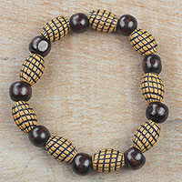 Wood and recycled plastic beaded stretch bracelet, 'Good Spirals' - Spiral Motif Wood and Plastic Stretch Bracelet from Ghana
