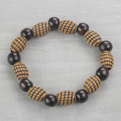 Wood and recycled plastic beaded stretch bracelet, 'Good Spirals' - Spiral Motif Wood and Plastic Stretch Bracelet from Ghana