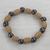 Wood and recycled plastic beaded stretch bracelet, 'Good Spirals' - Spiral Motif Wood and Plastic Stretch Bracelet from Ghana (image 2b) thumbail