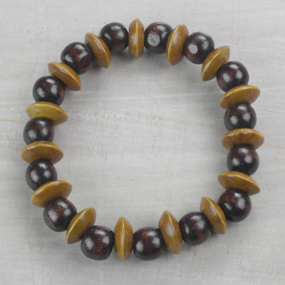 Wood beaded stretch bracelet, 'Adukrom Beauty' - Dark Brown Wood Beaded Stretch Bracelet from Ghana