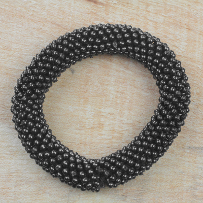 Recycled plastic beaded stretch bracelet, 'Dark Bubbles' - Black Recycled Plastic Beaded Stretch Bracelet from Ghana