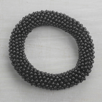 Recycled plastic beaded stretch bracelet, 'Dark Bubbles' - Black Recycled Plastic Beaded Stretch Bracelet from Ghana
