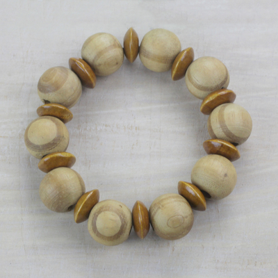 Wood beaded stretch bracelet, 'Natural Circles' - Light Brown Sese Wood Beaded Stretch Bracelet from Ghana