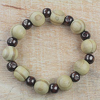 Wood beaded stretch bracelet, 'Circle of Beauty' - Handcrafted Sese Wood Beaded Stretch Bracelet from Ghana