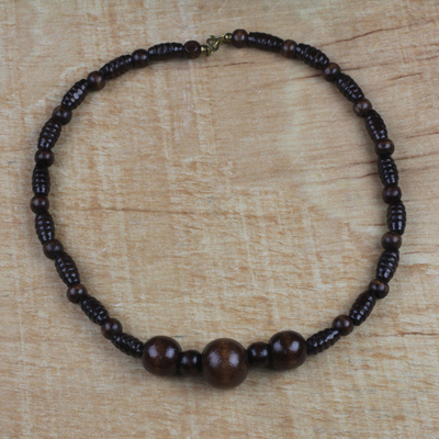 Wood beaded pendant necklace, 'Village Love' - Handmade Sese Wood Beaded Pendant Necklace from Ghana