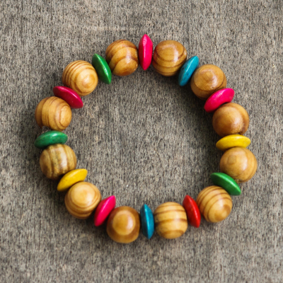 Stretcharmband mit Holzperlen, 'Eye of the Parrot' (Auge des Papageis) - Mehrfarbiges Sese Wood Beaded Stretch-Armband aus Ghana