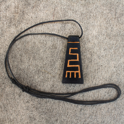 Wood pendant necklace, 'Nkyinkyim' - Long Sese Wood Pendant Necklace Hand Crafted in Ghana