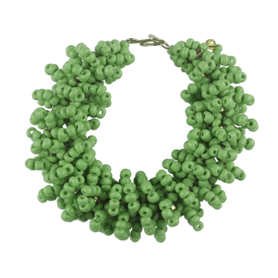 Recycled glass beaded bracelet, 'Kiwi Burst' - Green Recycled Glass Beaded Bracelet from Ghana