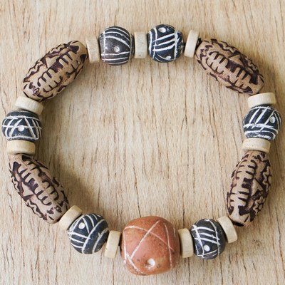 Ceramic and wood beaded stretch bracelet, 'Fanosaa' - Ceramic and Wood Beaded Stretch Bracelet from Ghana
