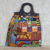 Handtasche mit Lederakzent und Baumwollgriff - Mehrfarbige Patchwork-Handtasche aus Baumwolle mit Lederakzenten