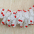 Perlenkette aus recyceltem Kunststoff - Rote und weiße Perlenkette aus recyceltem Kunststoff aus Ghana