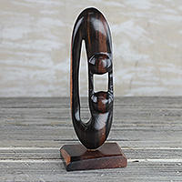 Ebony wood sculpture, 'Balance and Strength' - Ebony Wood Hand Carved Sculpture of Two Figures from Ghana