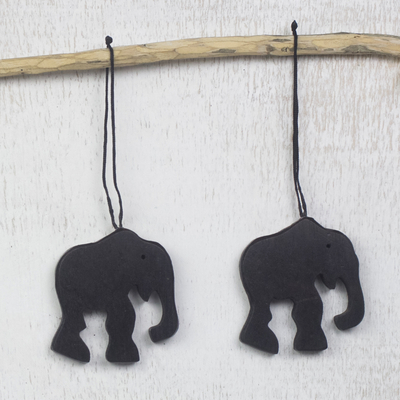 Ebony wood ornaments, 'Trunk Bearers' (set of 4) - Handcrafted Ebony Wood Elephant Ornaments (Set of 4)
