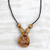 Wood pendant necklace, 'Somemu' - Engraved Sese Wood Bird Beaded Pendant Necklace thumbail