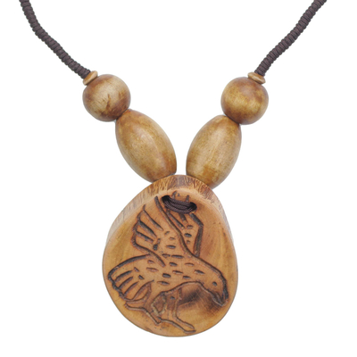 Wood pendant necklace, 'Somemu' - Engraved Sese Wood Bird Beaded Pendant Necklace