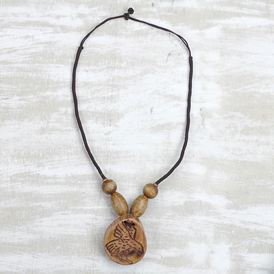 Wood pendant necklace, 'Somemu' - Engraved Sese Wood Bird Beaded Pendant Necklace