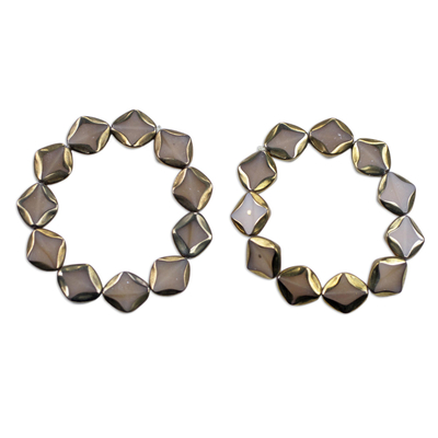 Recycled glass beaded stretch bracelets, 'Suumo' (pair) - Pair of Recycled Glass Golden Beaded Stretch Bracelets
