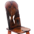 Wood chair, 'Village Rest' - Village Scene Redwood Chair Crafted in Ghana
