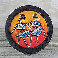 Wood decorative plate, 'Dancing Women' - Hand-Painted Wood Dance-Themed Decorative Plate from Ghana