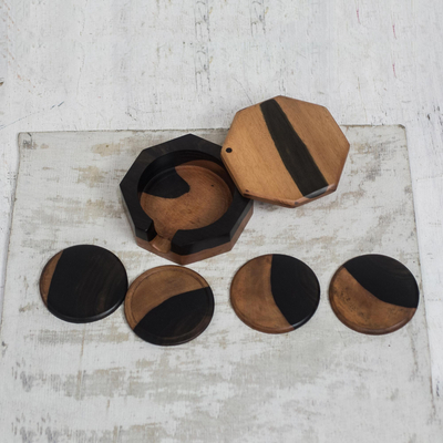Ebony wood coasters, 'Shifting Earth' (set of 4) - Handcrafted Ebony Wood Coasters from Ghana (Set of 4)